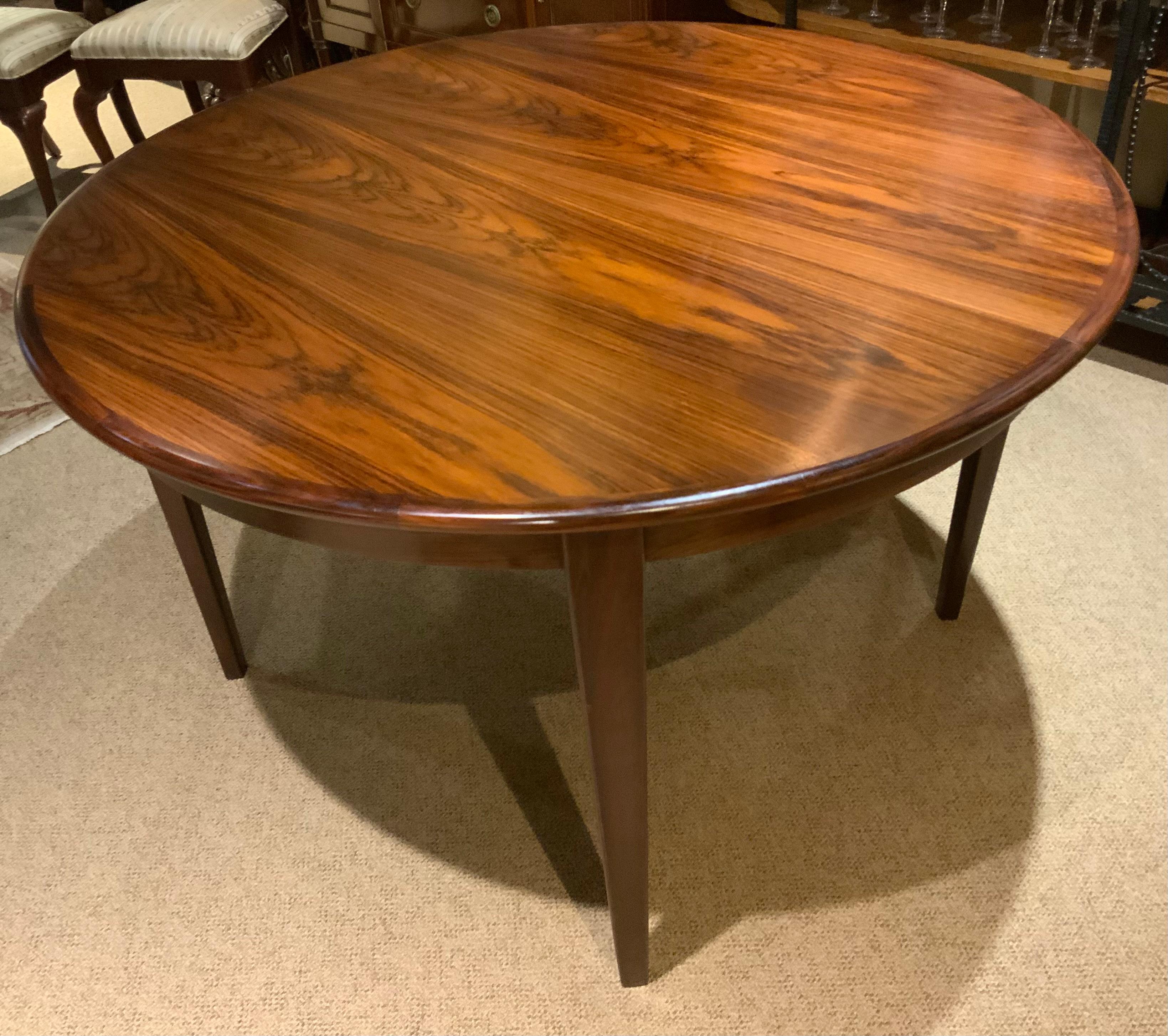 20th Century Round  rosewood dining table by sigh and sons, mid 20 th c.  For Sale