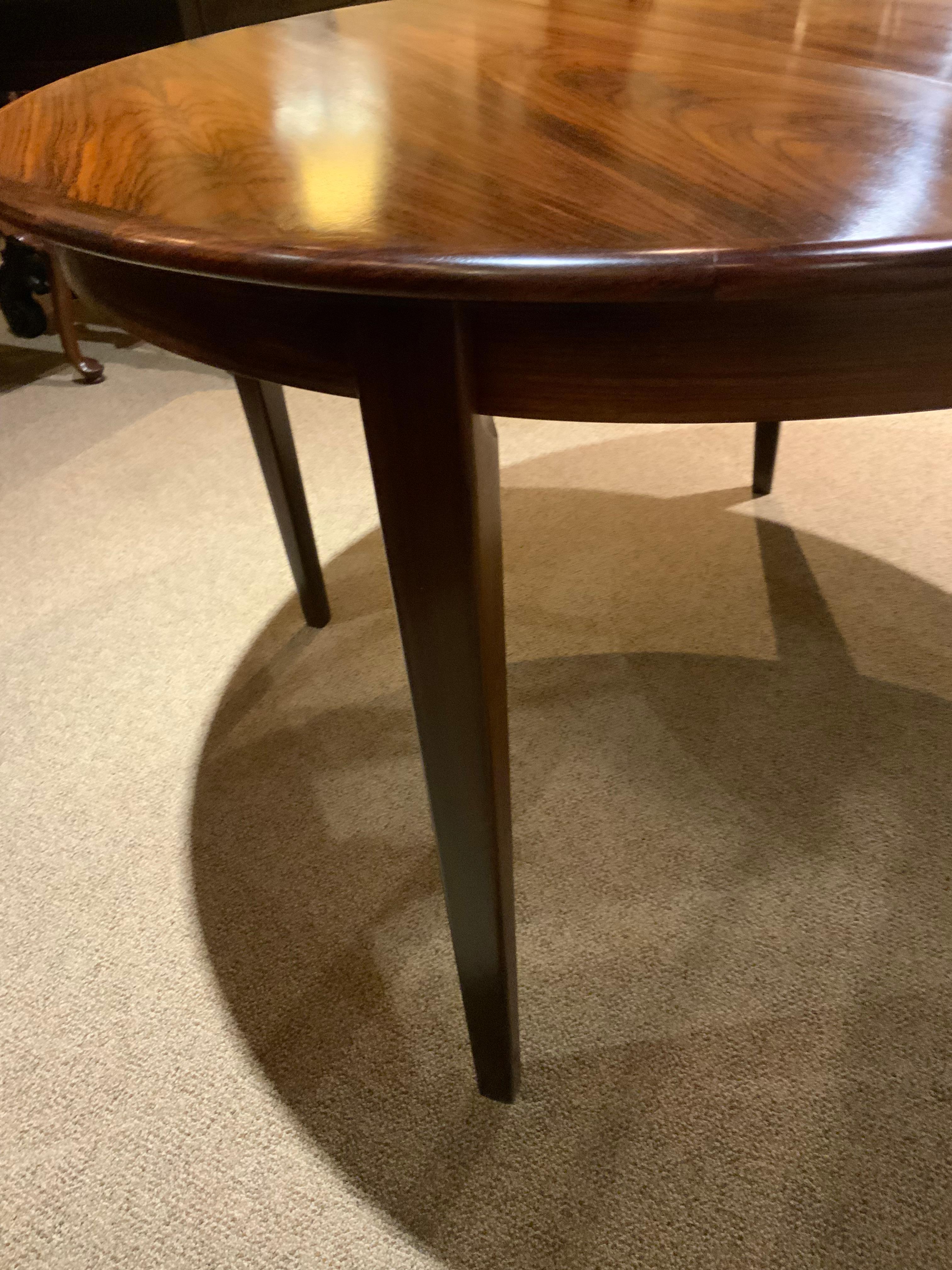 Round  rosewood dining table by sigh and sons, mid 20 th c.  For Sale 1
