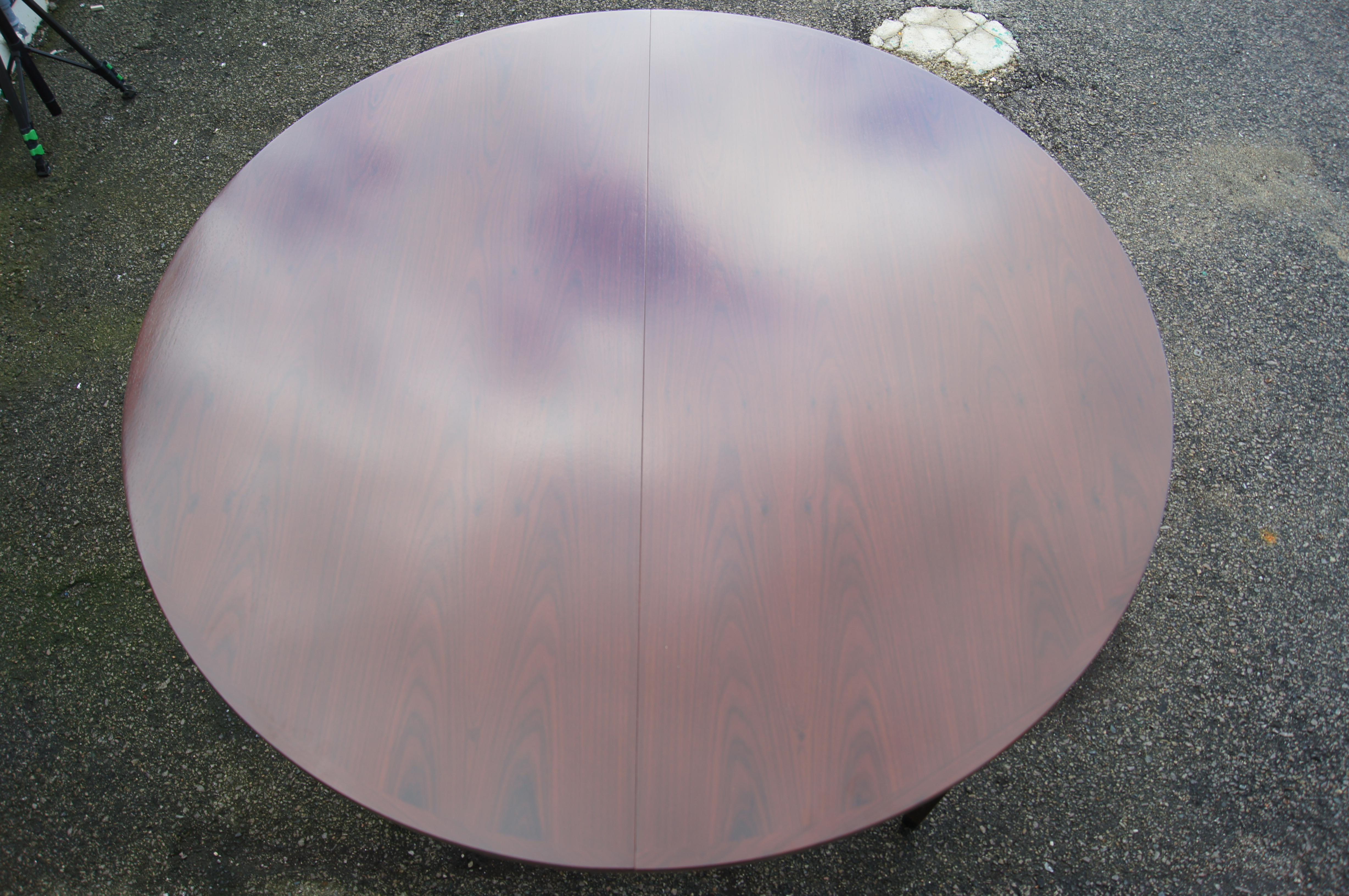 Scandinavian Modern Round Rosewood Dining Table with Extension by Arne Vodder For Sale
