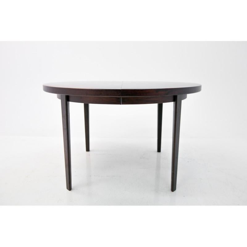 A round table from Denmark, was produced in the 1960s.
Dark rosewood preserved in very good condition.
The table can be extended with two cartridges with a total length of 320cm.