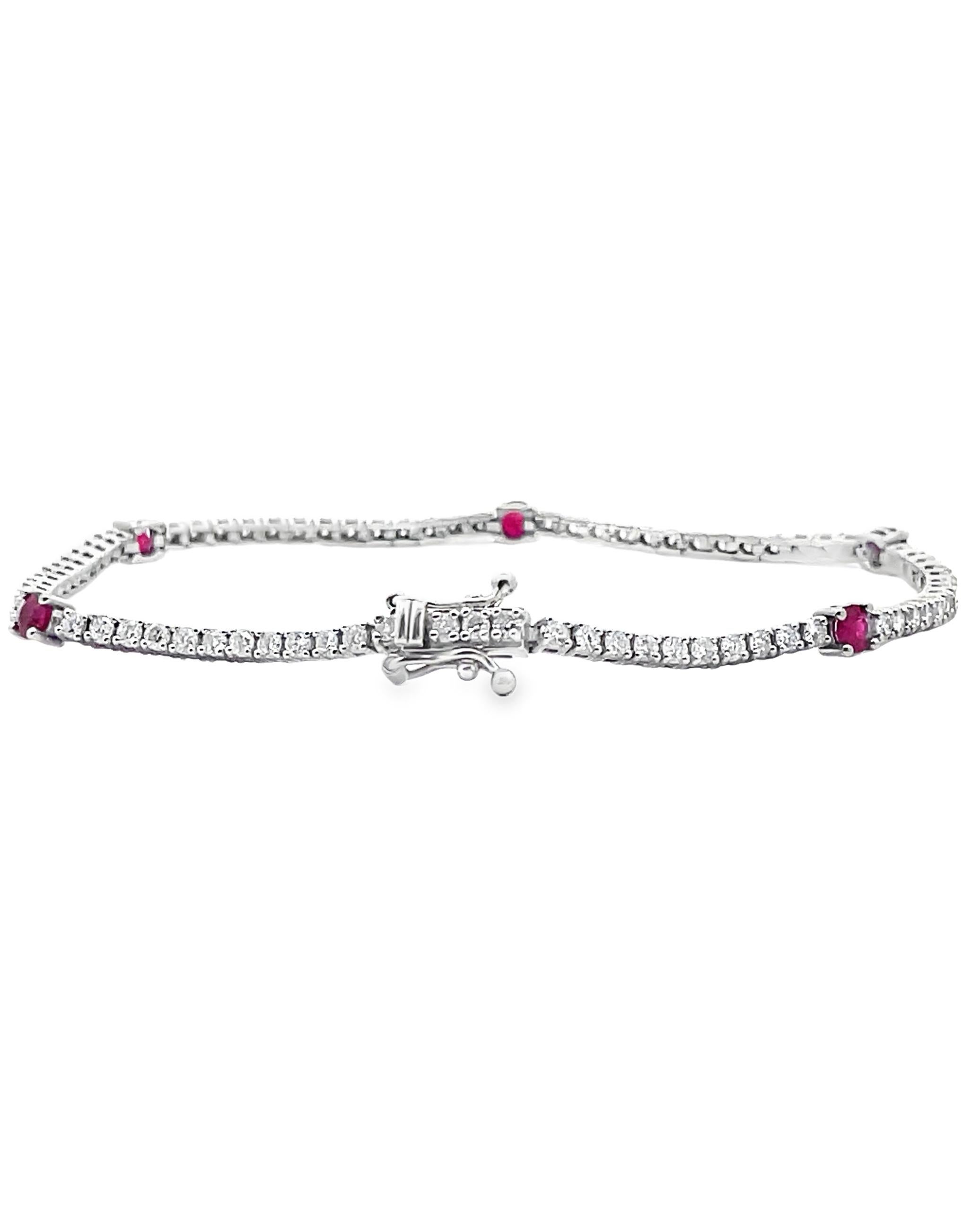 14K White Gold Line Bracelet with 77 Round Diamonds 1.73 carats and 5 Round Rubies 0.84 carat.

- 7 inches long
