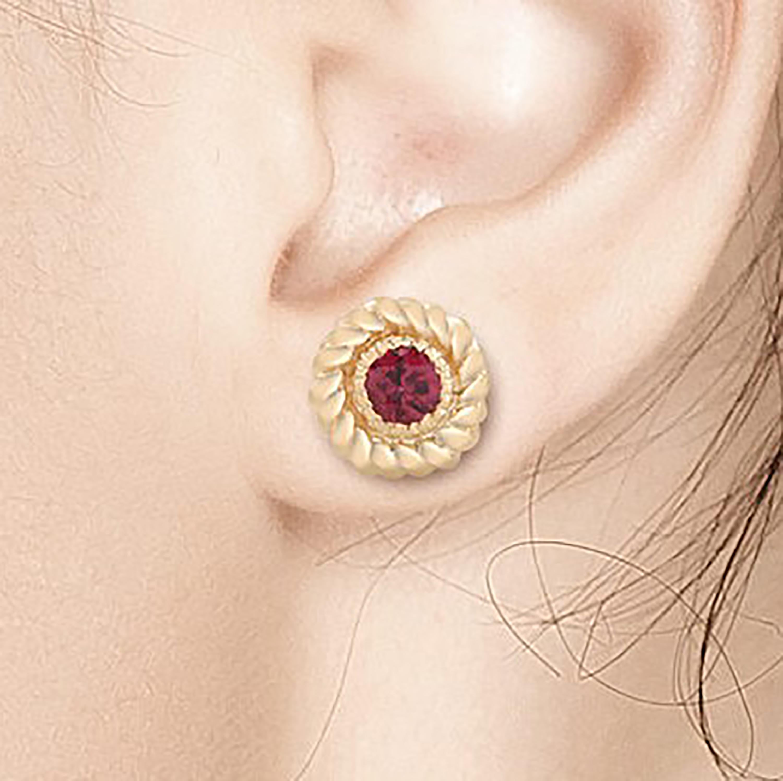 14 karats yellow gold braided bezel set ruby stud earrings
Rubies weighing 0.30 carat
Bezel stud earrings
Push backs
Handmade in the USA

