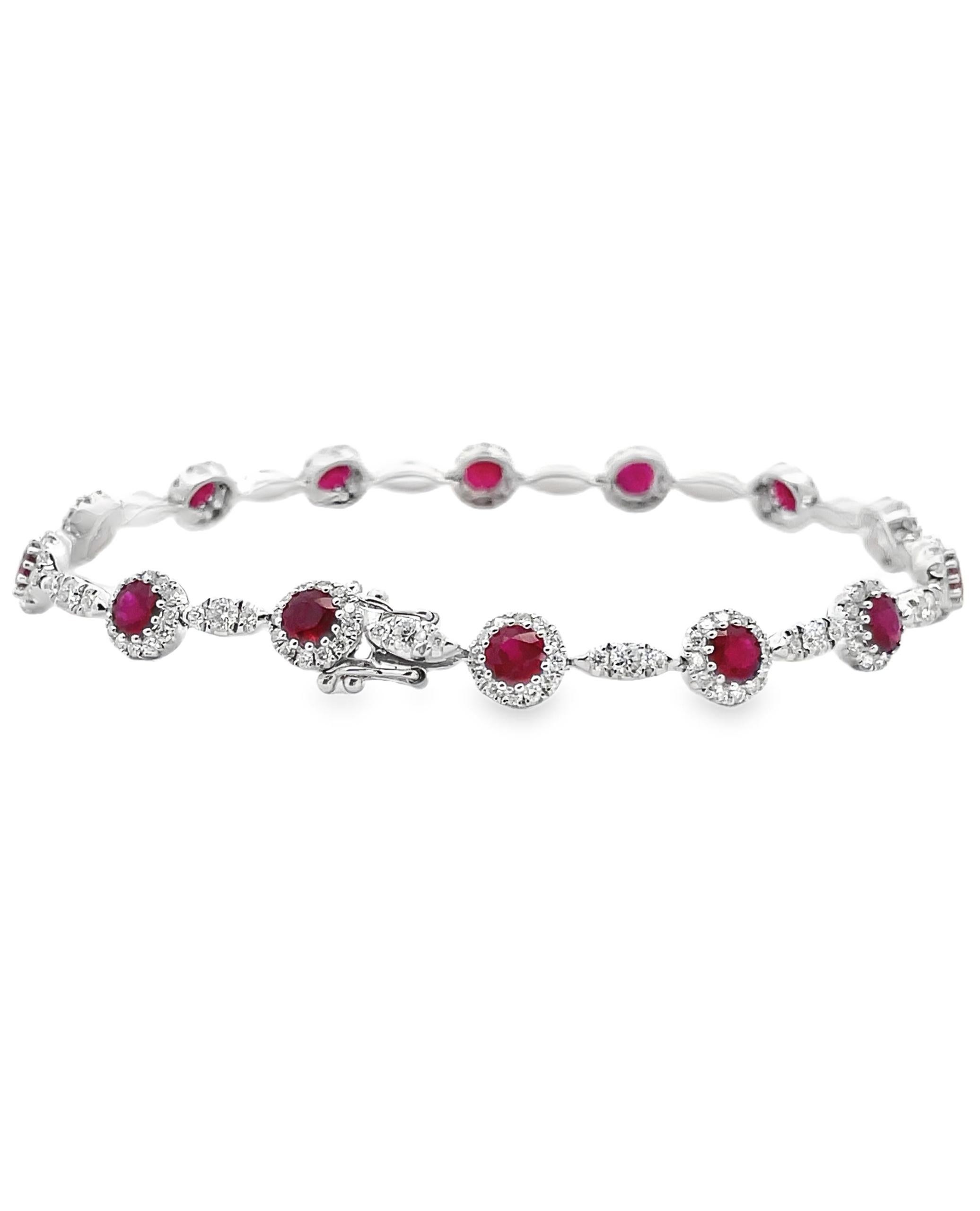 14K white gold bracelet with rubies weighing 4.08 carats total and diamonds weighing 2.00 carats total.

- Bracelet is 7 inches long