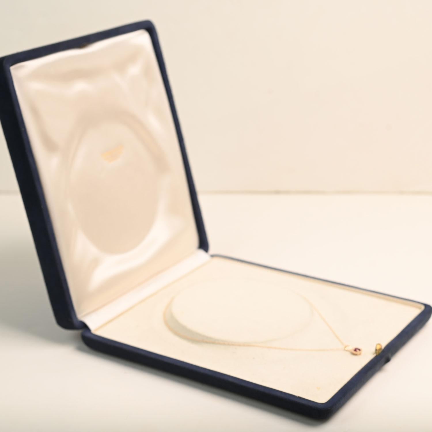 Round Cut Round Ruby with Diamond Halo Necklace (Approx 0.50-Carats) 14K Yellow Gold For Sale