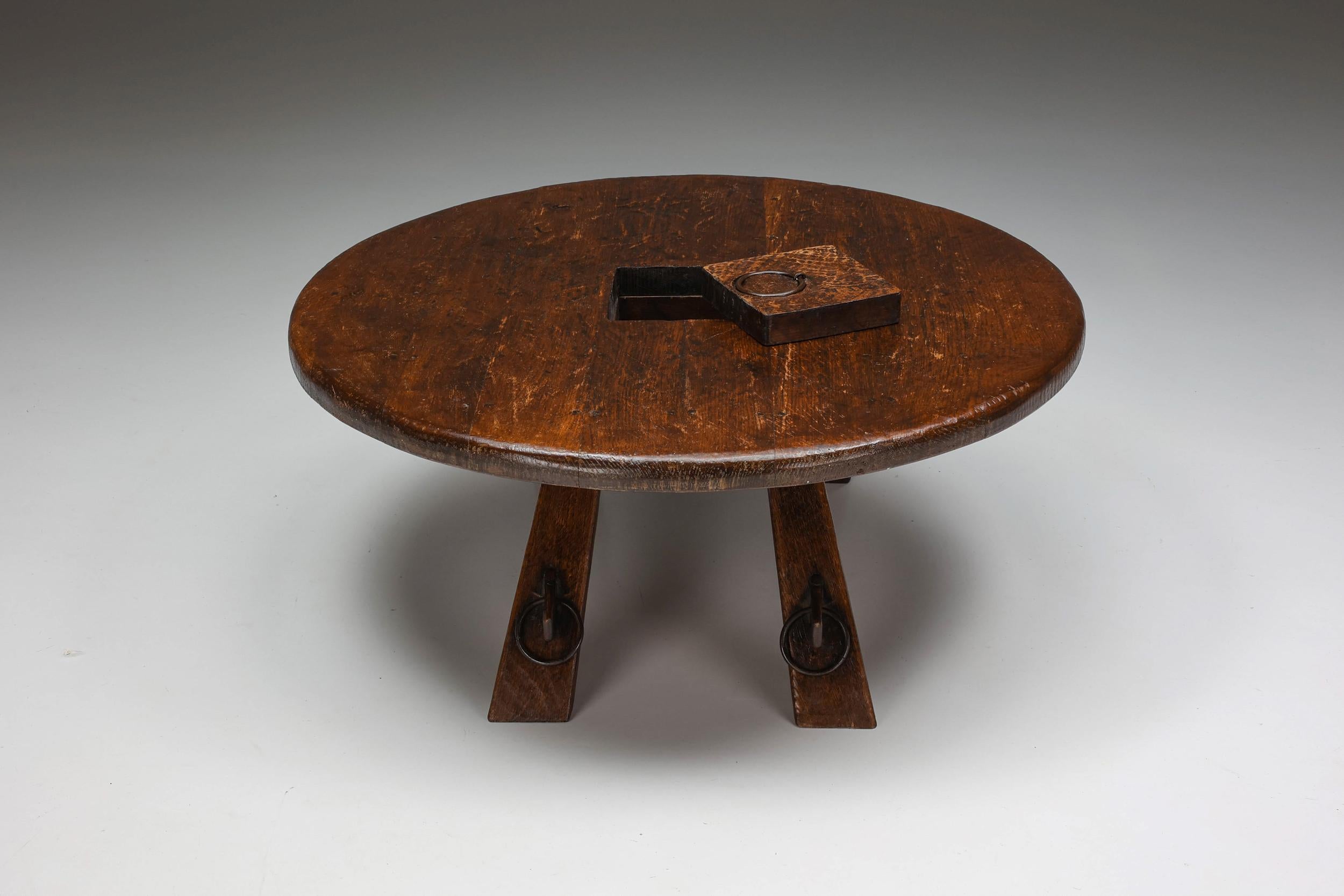 Coffee table; Craftmanship; Wabi-Sabi; Rustic; 1960's; Patina; Rustic furniture; 

Rustic round coffee table with ring detail in the middle, a sign of impeccable craftsmanship. Embracing the principles of wabi-sabi, this side table shows great