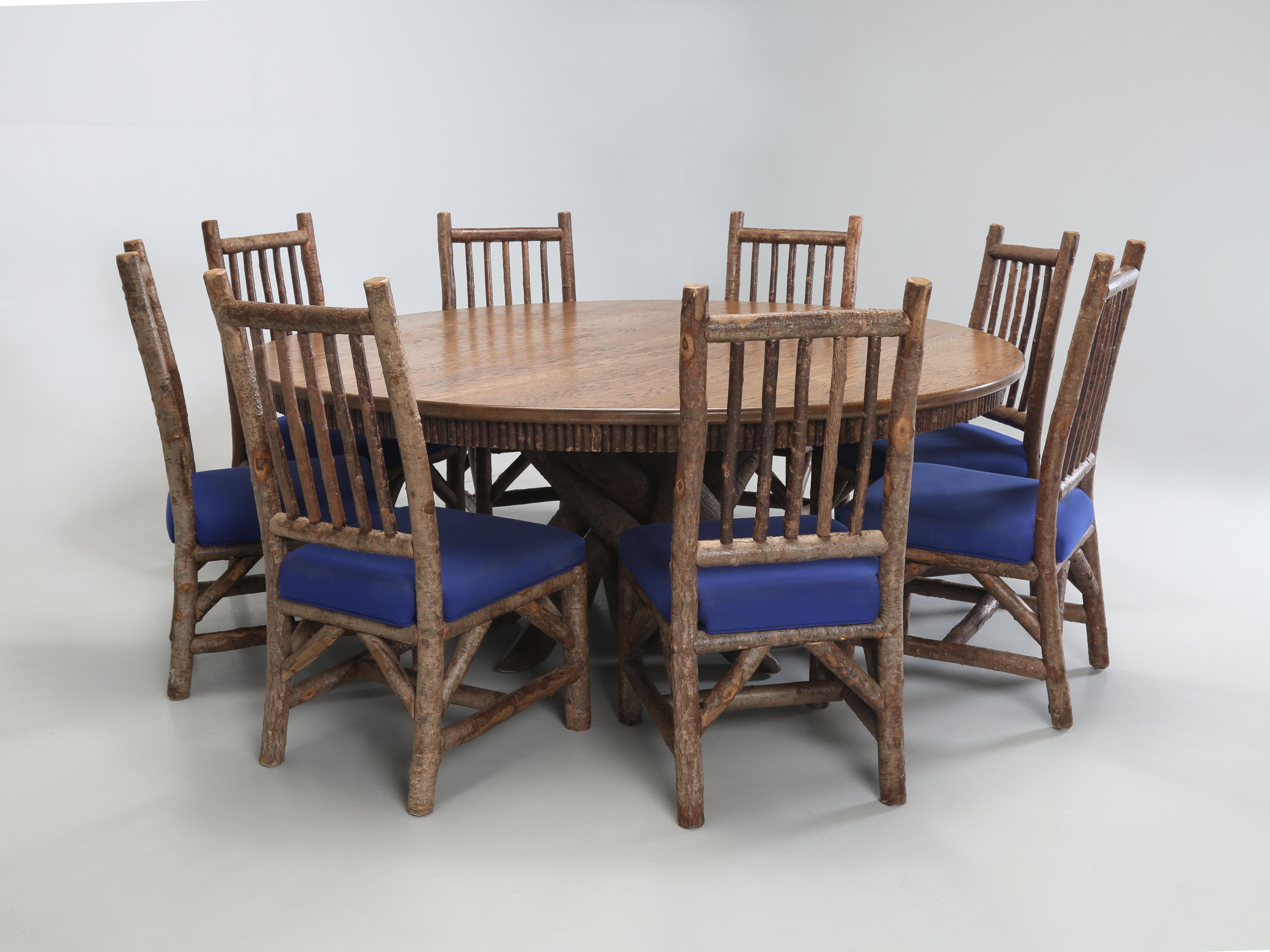Round Solid Oak that was Hand-Scraped Dining Room Table Seat (8) Made in Wisconsin.
Admittedly, for a company who specializes in Country French Antiques, this is a bit unusual for us to offer. However, the quality that La Lune of Milwaukee Wisconsin