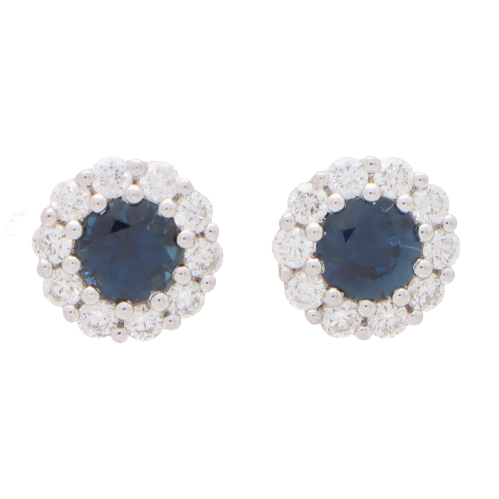 Modern Round Sapphire and Diamond Cluster Earrings Set in 18k White Gold For Sale