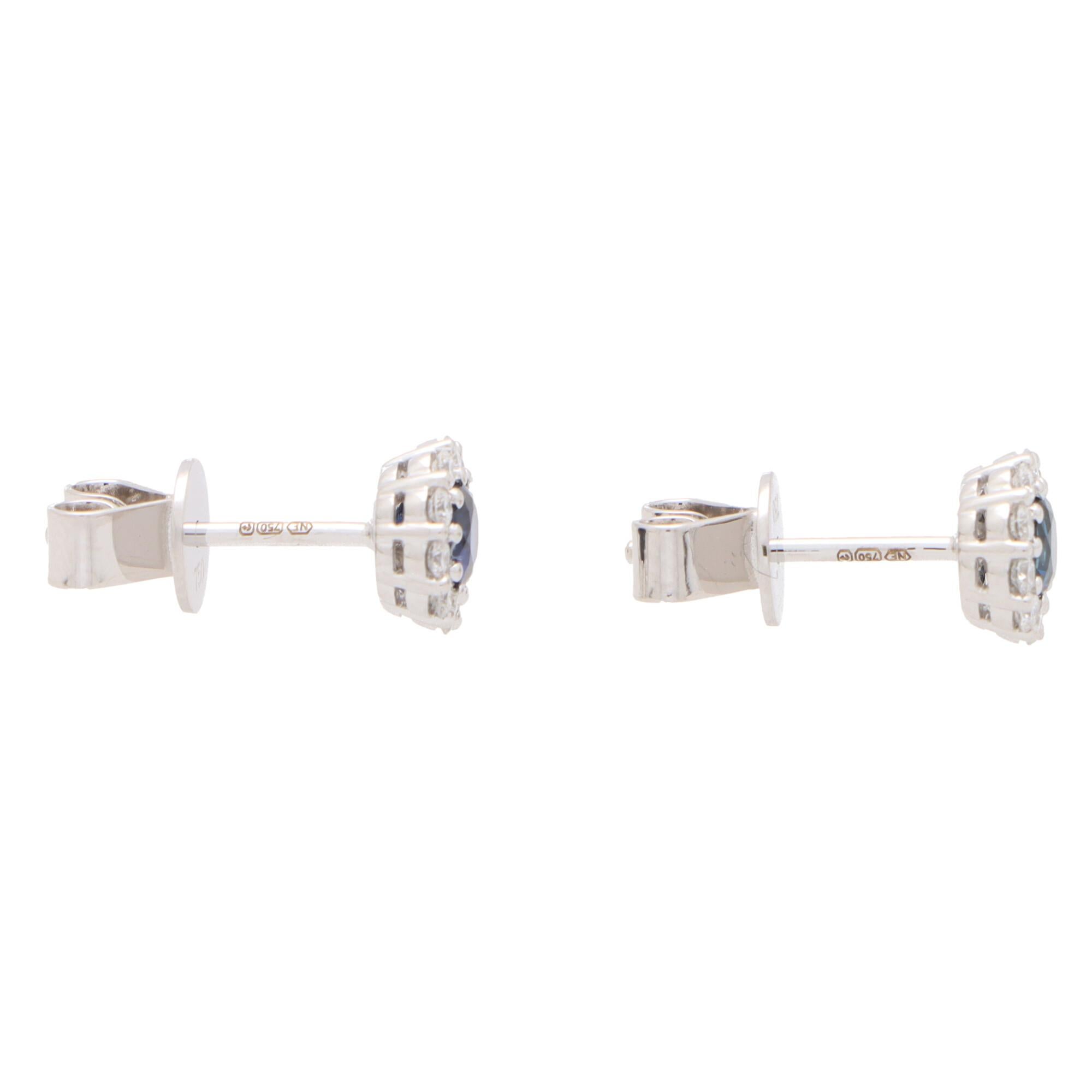 Round Cut Round Sapphire and Diamond Cluster Earrings Set in 18k White Gold For Sale