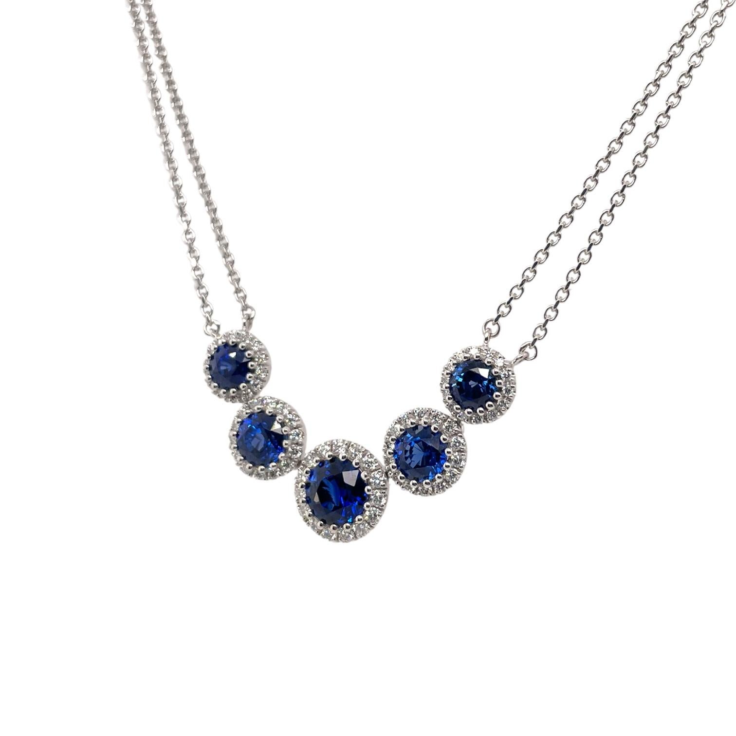 Sapphire and diamond cluster necklace in 14k white gold. Necklace contains 5 round brilliant sapphires, 2.80tcw and round brilliant diamonds, 0.50tcw. Diamonds are near colorless and SI1 in clarity. Stones are all mounted in handmade prong settings.