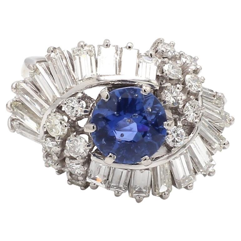 Round Sapphire Ring with Baguette and Brilliant Diamonds