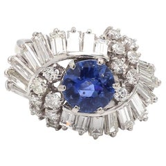 Round Sapphire Ring with Baguette and Brilliant Diamonds