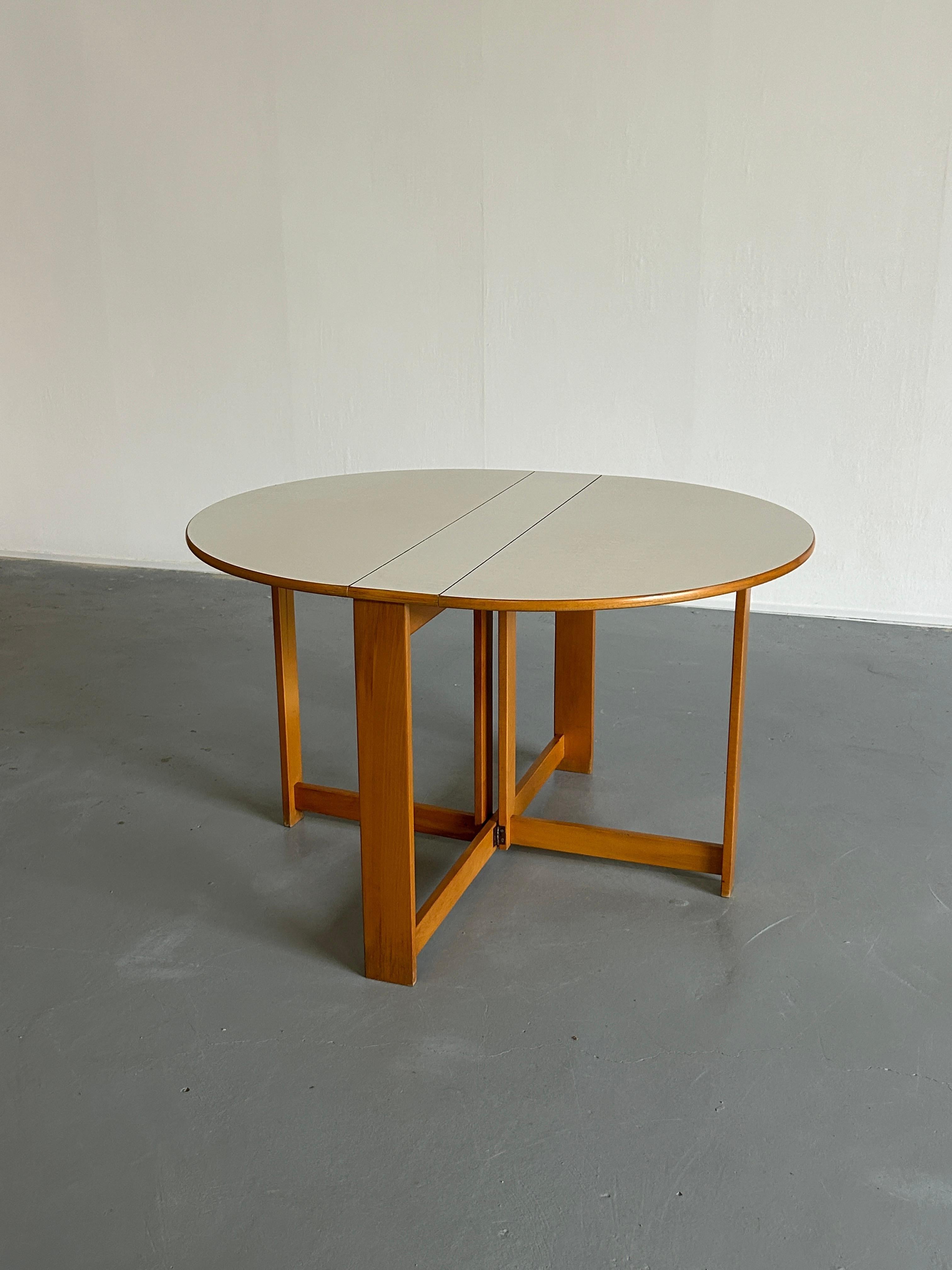 folding round dining table