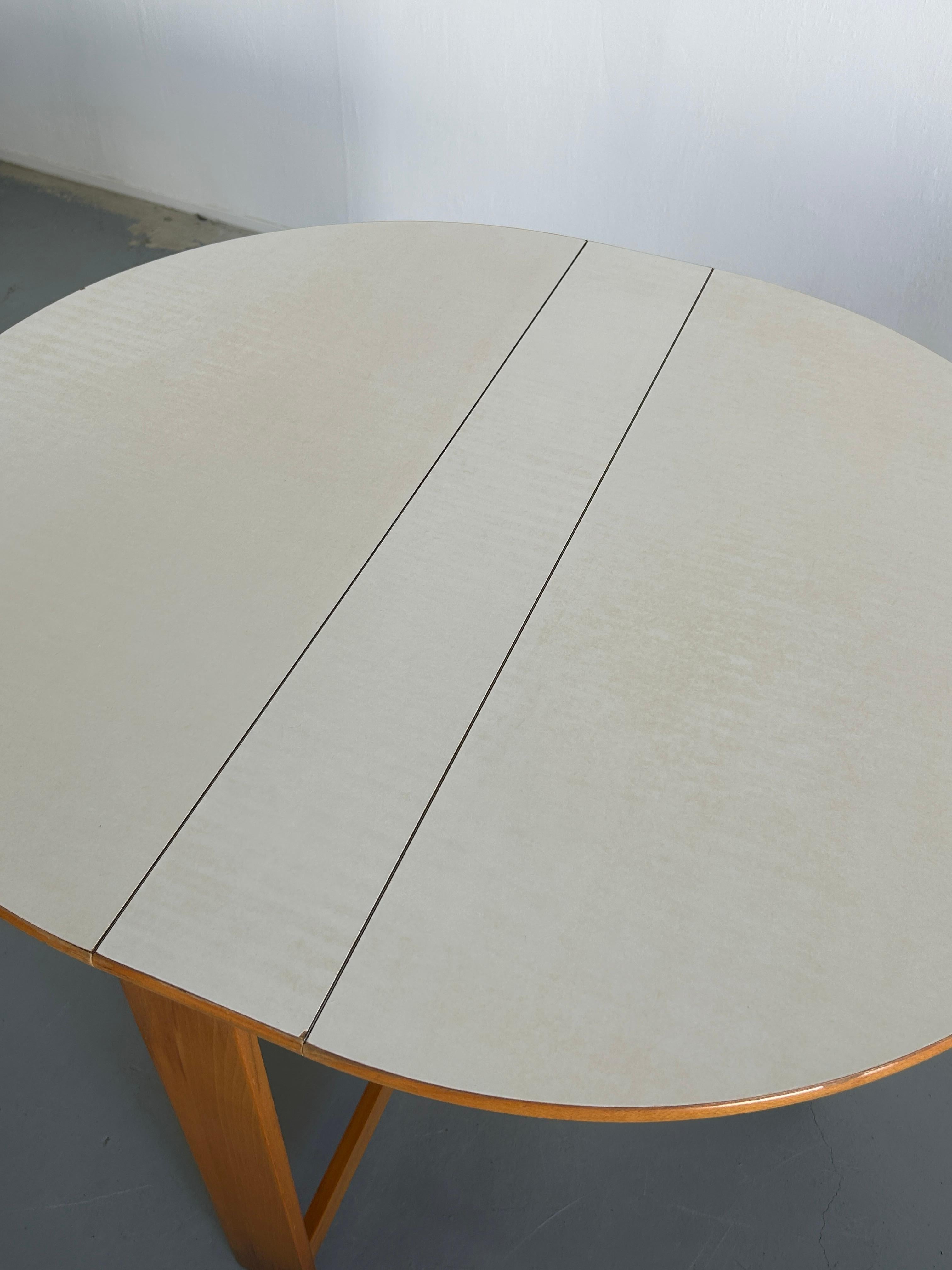 Mid-Century Modern Round Scandinavian Vintage Oakwood Foldable Dining Table with Side Wings, 1970s