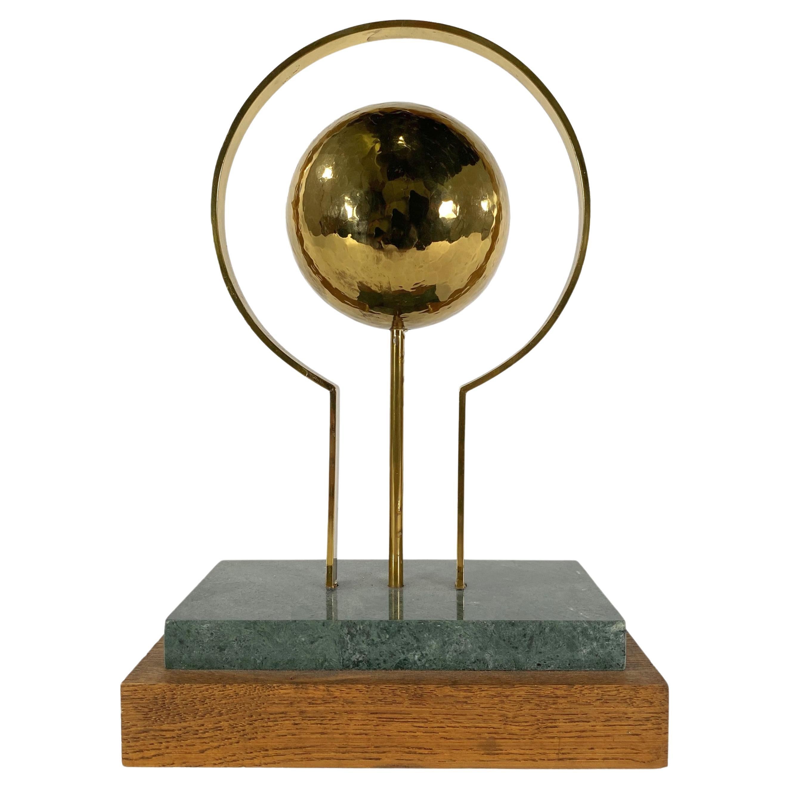 Round Sculpture in Brass with Rectangular Base For Sale