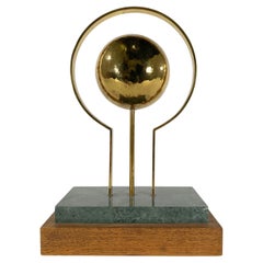 Round Sculpture in Brass with Rectangular Base