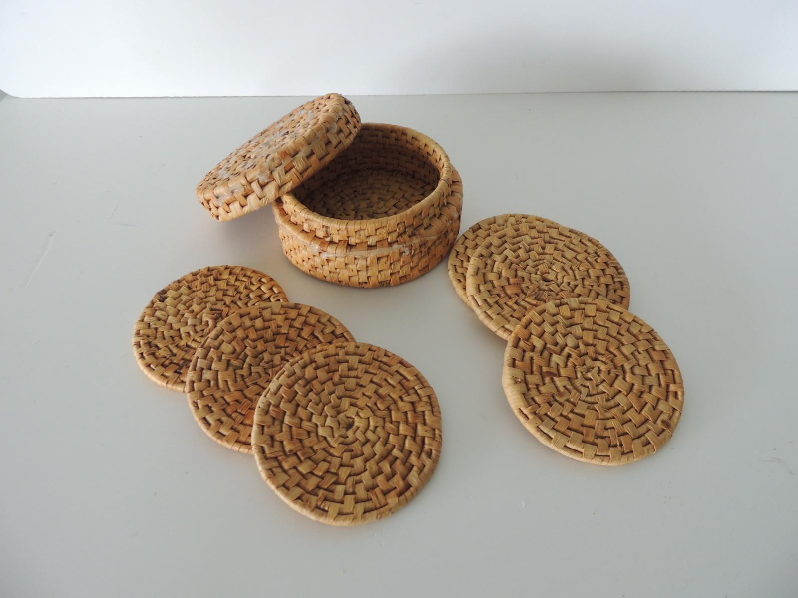 Round set of (6) seagrass woven coasters
with woven dispenser.
Size: 4