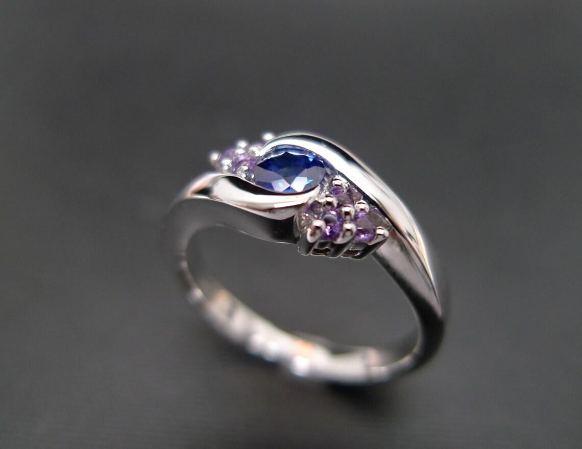For Sale:  Round Shape Blue Sapphire Amethyst Twisted Tension Engagement Ring White Gold 5