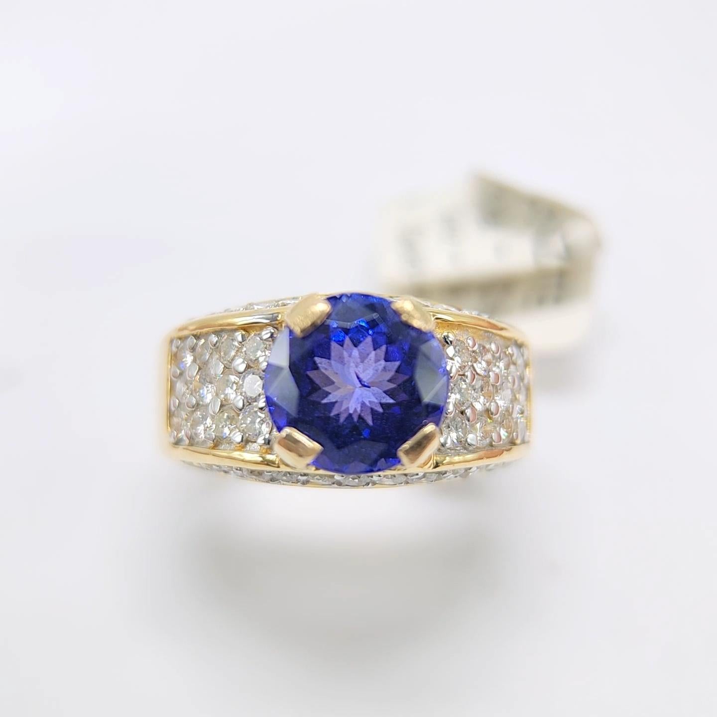 Round Tanzanite Ring & Diamonds , Round shape Tanzanite AAA brilliant deep Blue 3.16 carat .
Total all Diamonds 1.10 carat G H-VVS, 
 18k White Gold 9.20 Grams, Finger Size 6.5