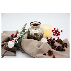 Round-shaped silver pot with engraved floral motifs