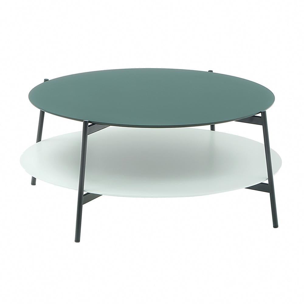 Round Shika coffee table by A+A Cooren
Materials: Base in chromed or black lacquered metal. Upper top in dark green, gray, or beige lacquered MDF Lower top in white lacquered MDF
Dimensions: 
Upper top: diameter 80 cm
Lower top: diameter 83