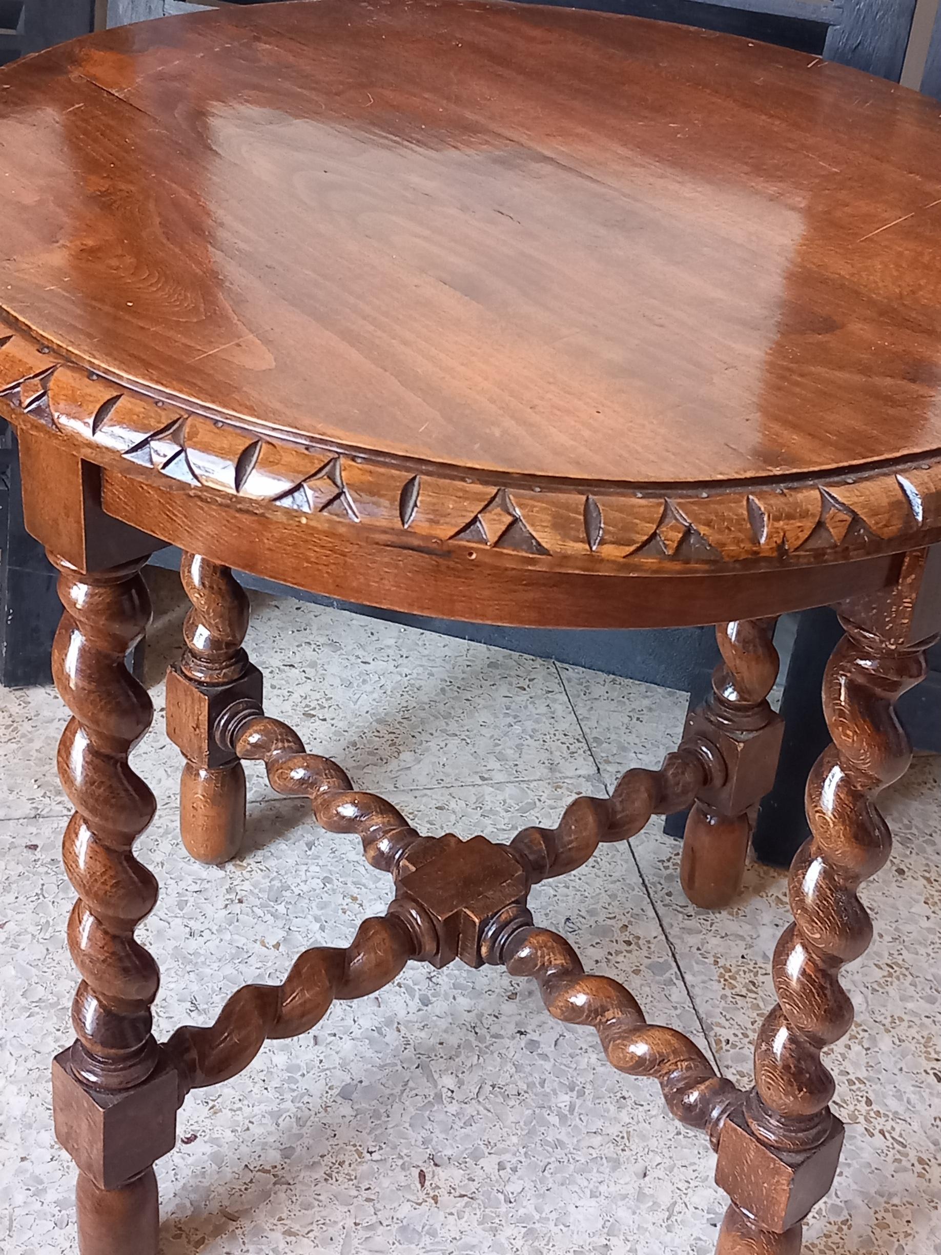 Beautiful  Side or end table, In perfect condition. Very well cared for

This table is raised on a base composed of four turned legs and a cross-shaped stretcher, also turned 

Lovely Round side table features barley twist legs, 19th Century

With
