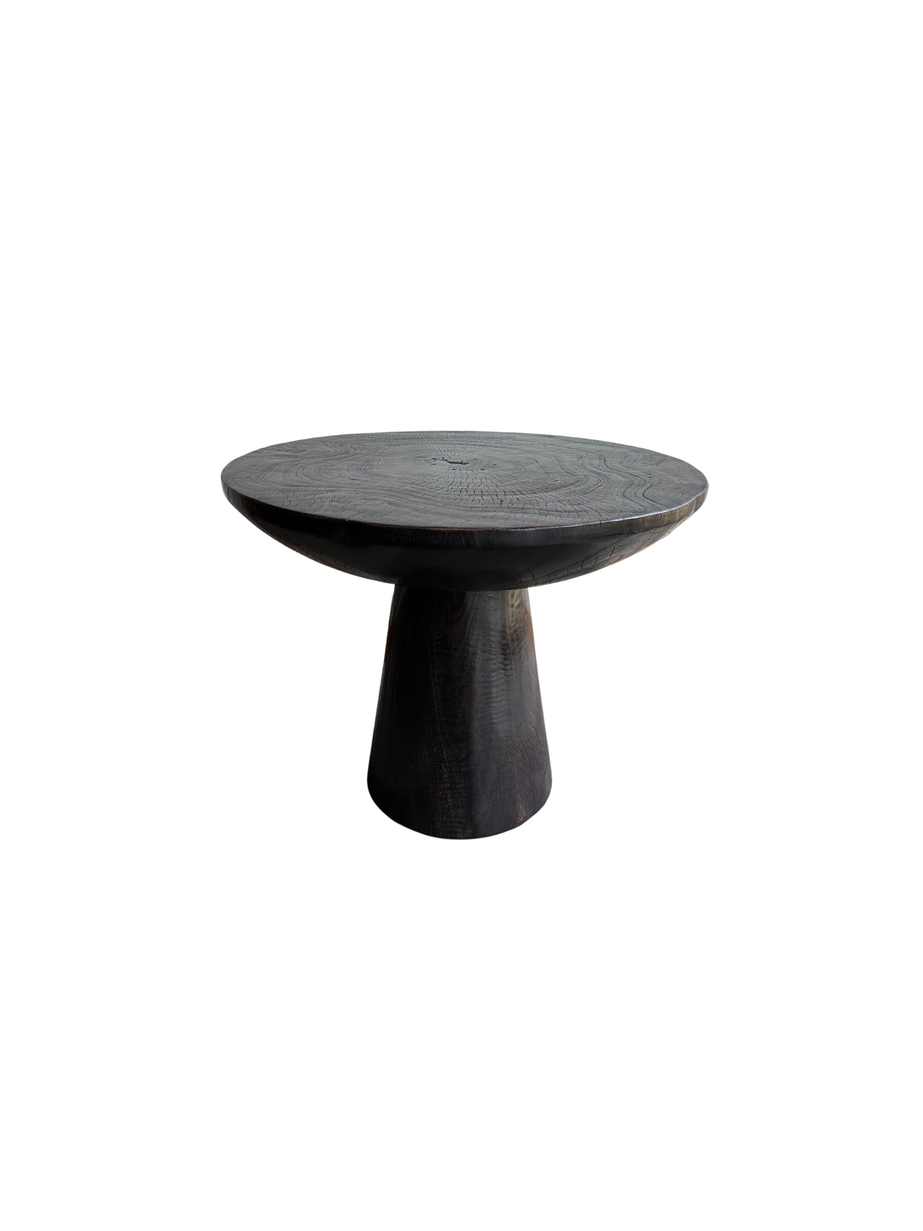 Indonesian Round Side Table Crafted from Mango Wood Burnt Finish For Sale