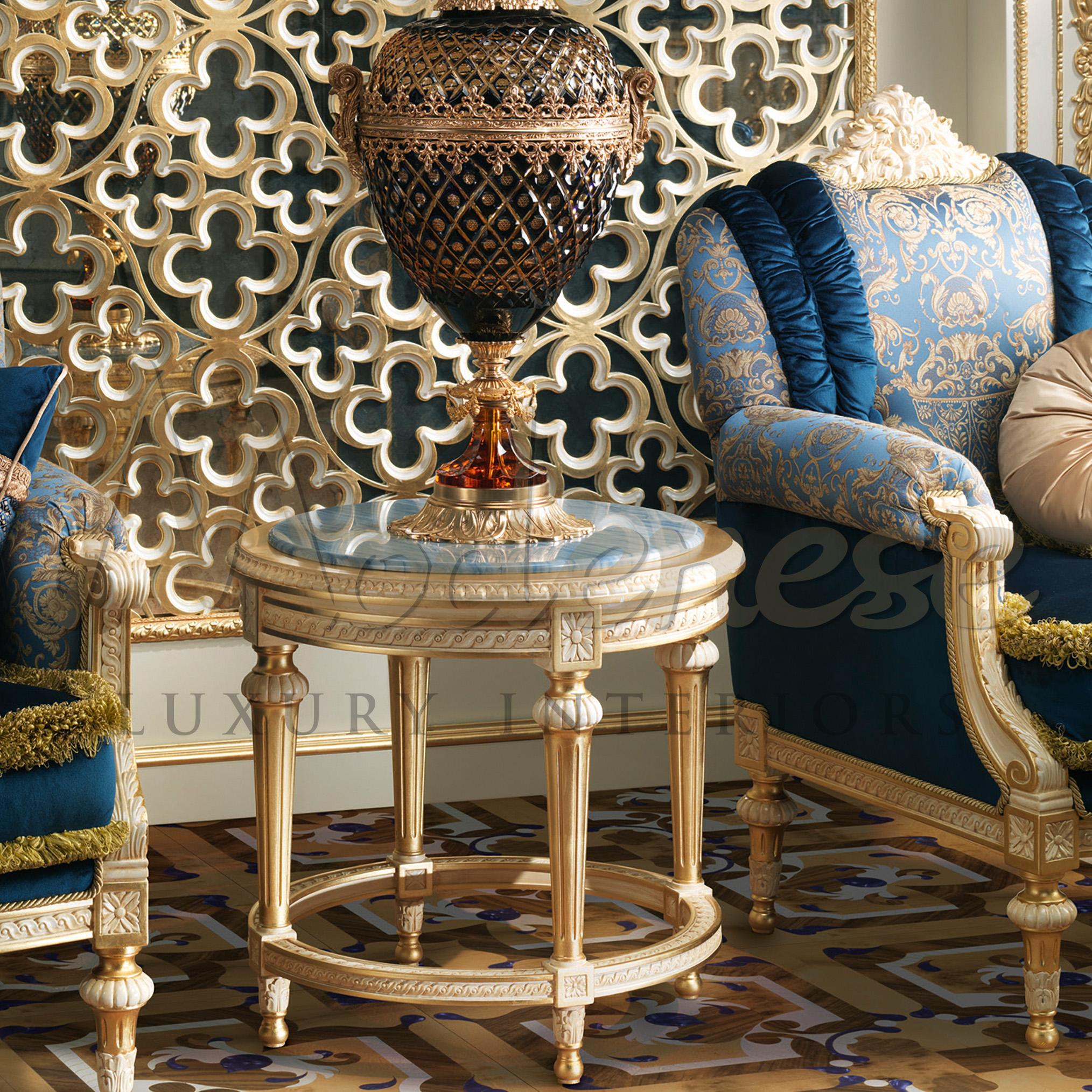 Modenese artisans kwoledge of gold leaf applications goes beyond imagination. The true essence of their work is shown through this magnificent round side table, that catches the eye with its tasteful combination of azul marble and shining gold leaf
