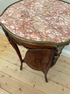 Round side table with red/white/beige marble