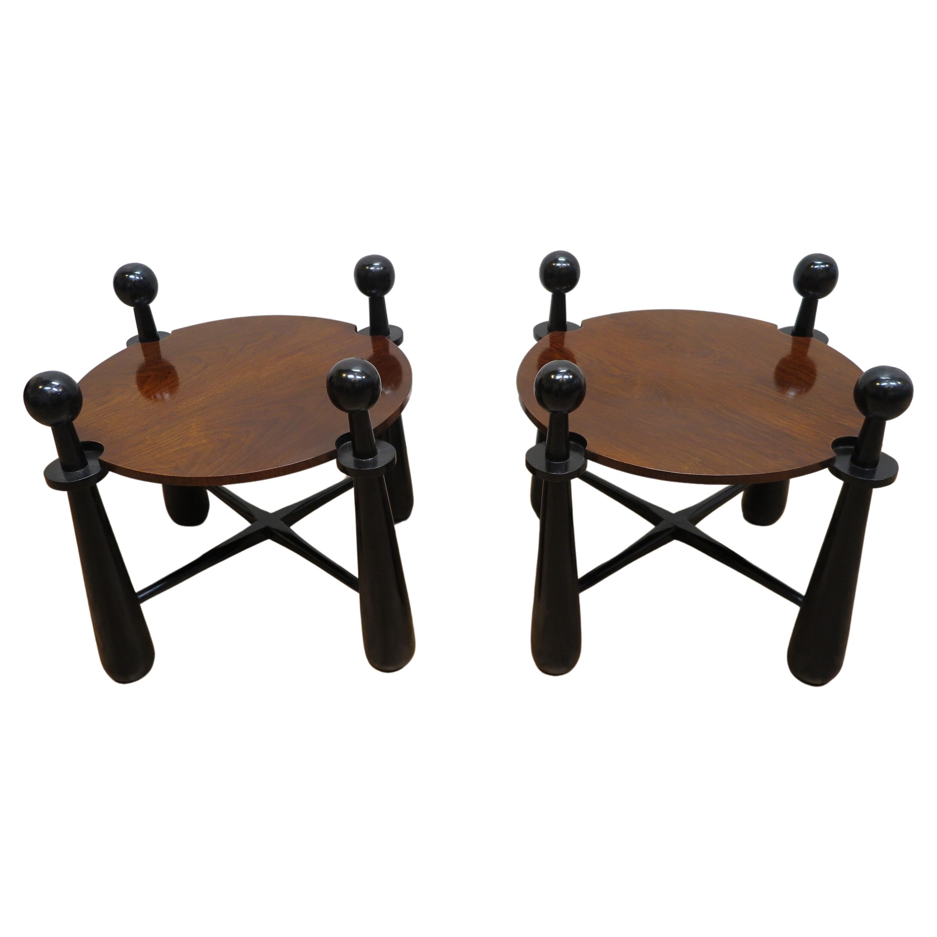 Pair of side tables in the style of Jean Royere. Outstanding Round Side Tables having inverted cone shaped legs toped with sphere finials. Demilune cutout details to the table platforms accentuate the raised sphere finial tops. Legs have X base