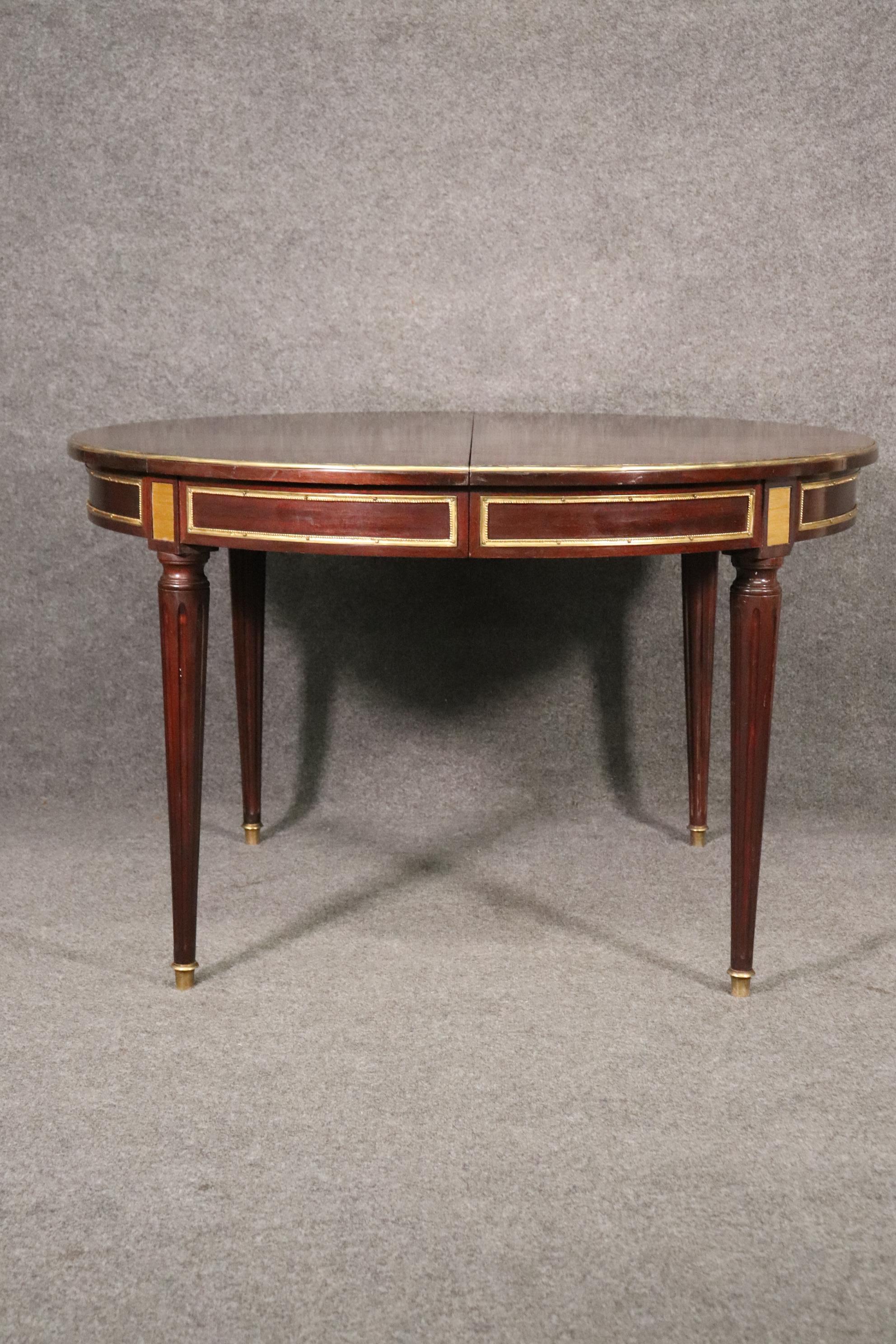 Round Signed Maison Jansen Brass Mounted Mahogany Louis XVI Dining Table w Leaf In Good Condition In Swedesboro, NJ