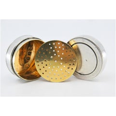 Round silver and gold vinaigrette box from the George III period