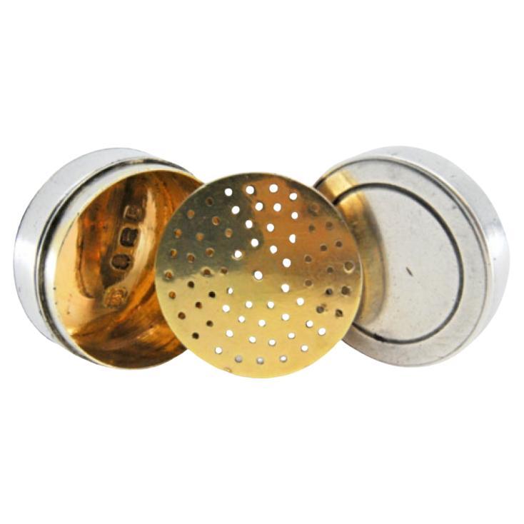 Round silver and gold vinaigrette box from the George III period