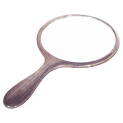 Miroir à main rond au design raffiné