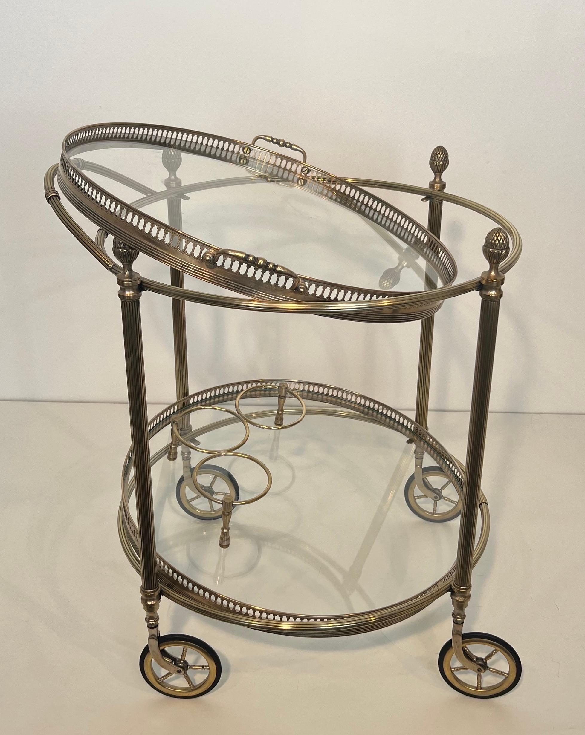 This very nice neoclassical Style Round Bar Cart is Made of Silvered Brass with removable trays. This is a French work by Maison Bagués. Circa 1940