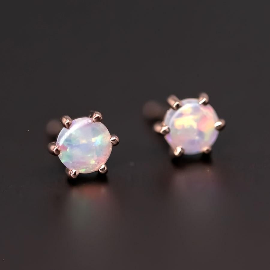 Round Shaped Minimalist Six Prong Australian Solid Opal Stud Earrings 14K Rose Gold.




Free Domestic USPS First Class Shipping! Free Gift Bag or Box with every order!

Opal—the queen of gemstones, is one of the most beautiful gemstones in the