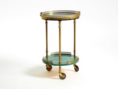 Round, small 1960s Aldo Tura serving or bar trolley in green goatskin leather