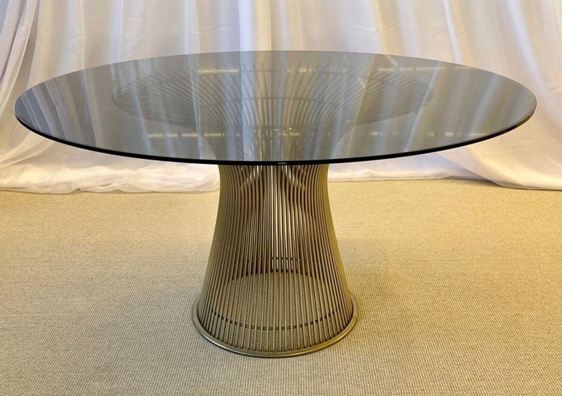 Round Smoked Glass Mid-Century Modern Warren Platner for Knoll dining room table
Vintage Warren Platner for Knoll Mid-Century modern dining table with circular tempered tinted beveled glass top on chrome basket base. The iconic dining table, which