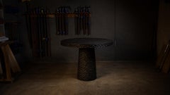 Round Solid Oak Dining Table with Hand-Carved Texture in Black by Sergio Vulpe