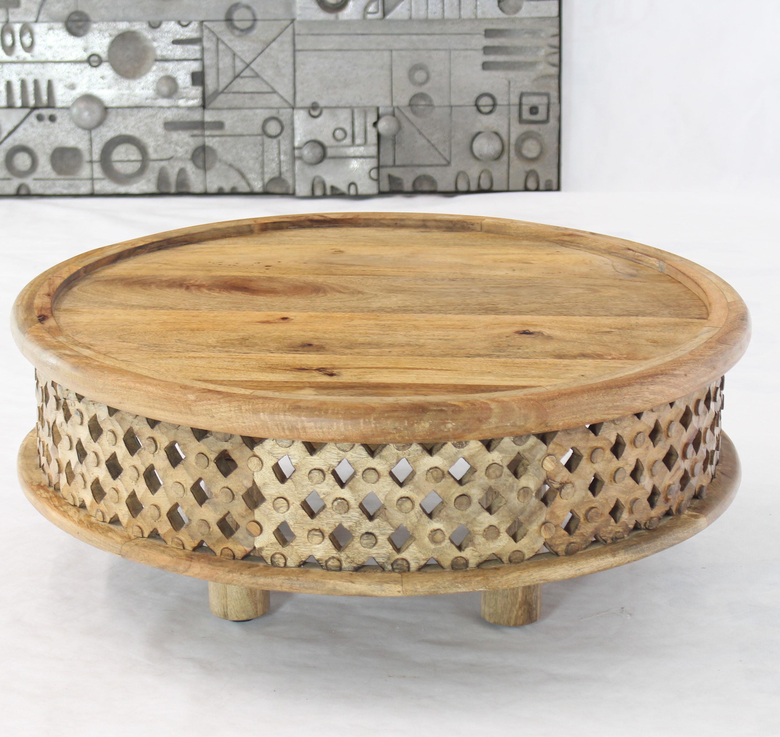 Good quality solid unfinished teak round coffee table.