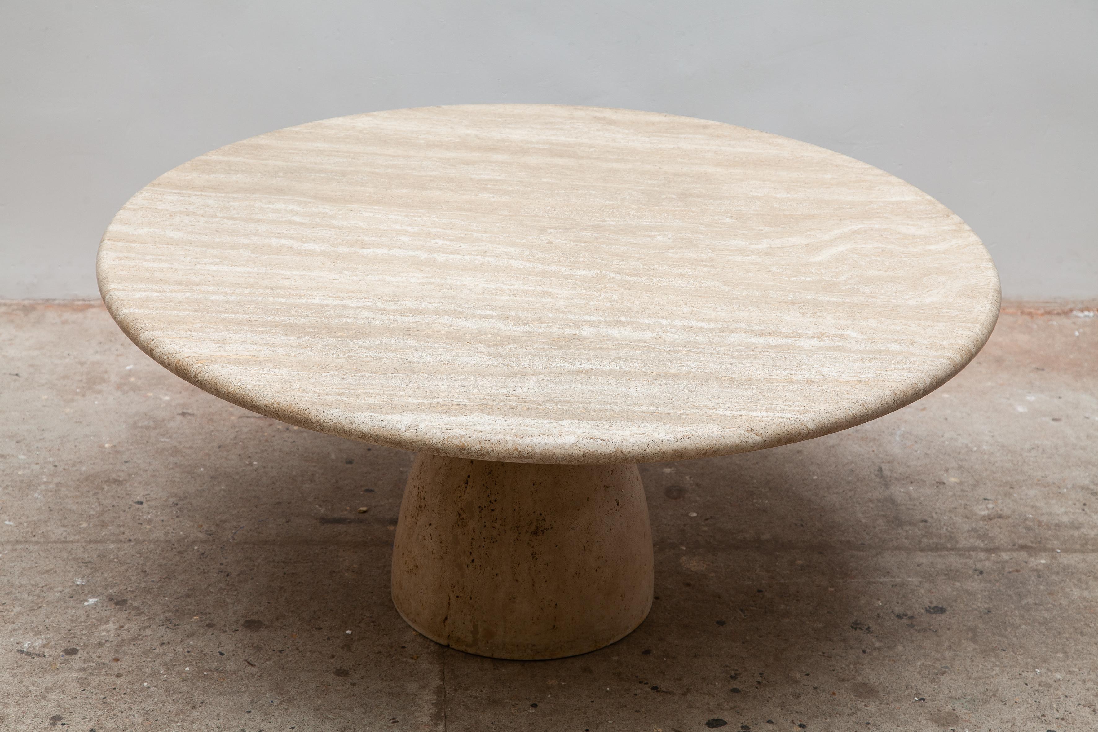 Travertine marble coffee table in a stylish and modern design by Peter Draenert for Draenert, model “Finale 1790” Germany, 1970s. Sturdy pedestal foot attaches to the top with screws. Off-white travertine marble with a natural finish.
Dimension: 110