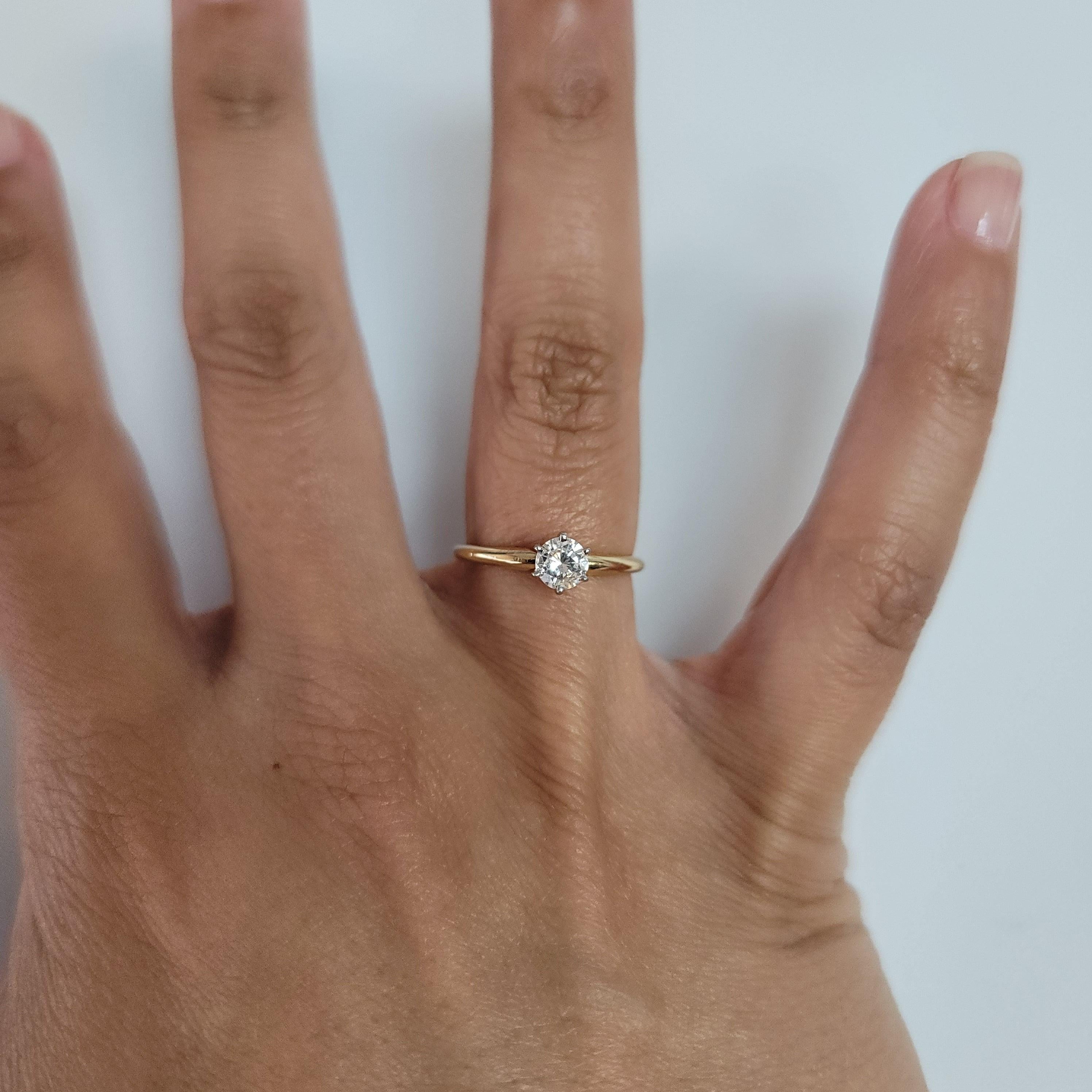 ♥ Product Summary ♥

Main Stone: Diamond
Approx. Diamond Carat Weight: .40cttw
Diamond Clarity: SI2
Diamond Color: G
Diamond Cut: Round 
Prong Material: 14k White Gold
Dimensions: 6mm x 5mm
Band Material: 14k Yellow Gold
Size: 6

Diamonds and