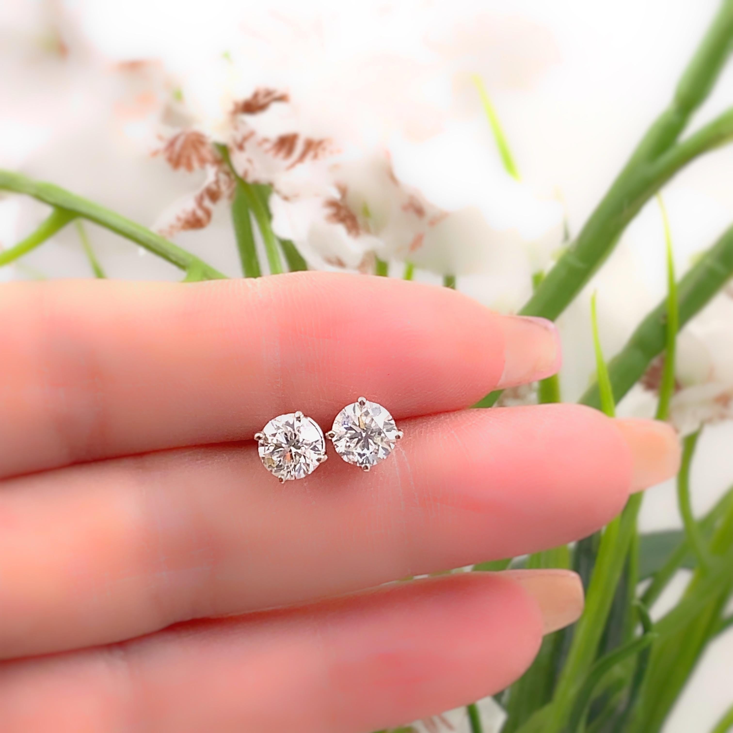 Round Brilliant Diamond Solitaire Stud Earrings
Style:  4 Prong Screw Back
Ref. number:  MP18925
Metal:  14kt White Gold
TCW:  1.85 tcw
Main Diamond:  2 Round Brilliant Diamonds
Color & Clarity:  H - I, I1 - I2 
Hallmark:  14KT
Includes:  Certified