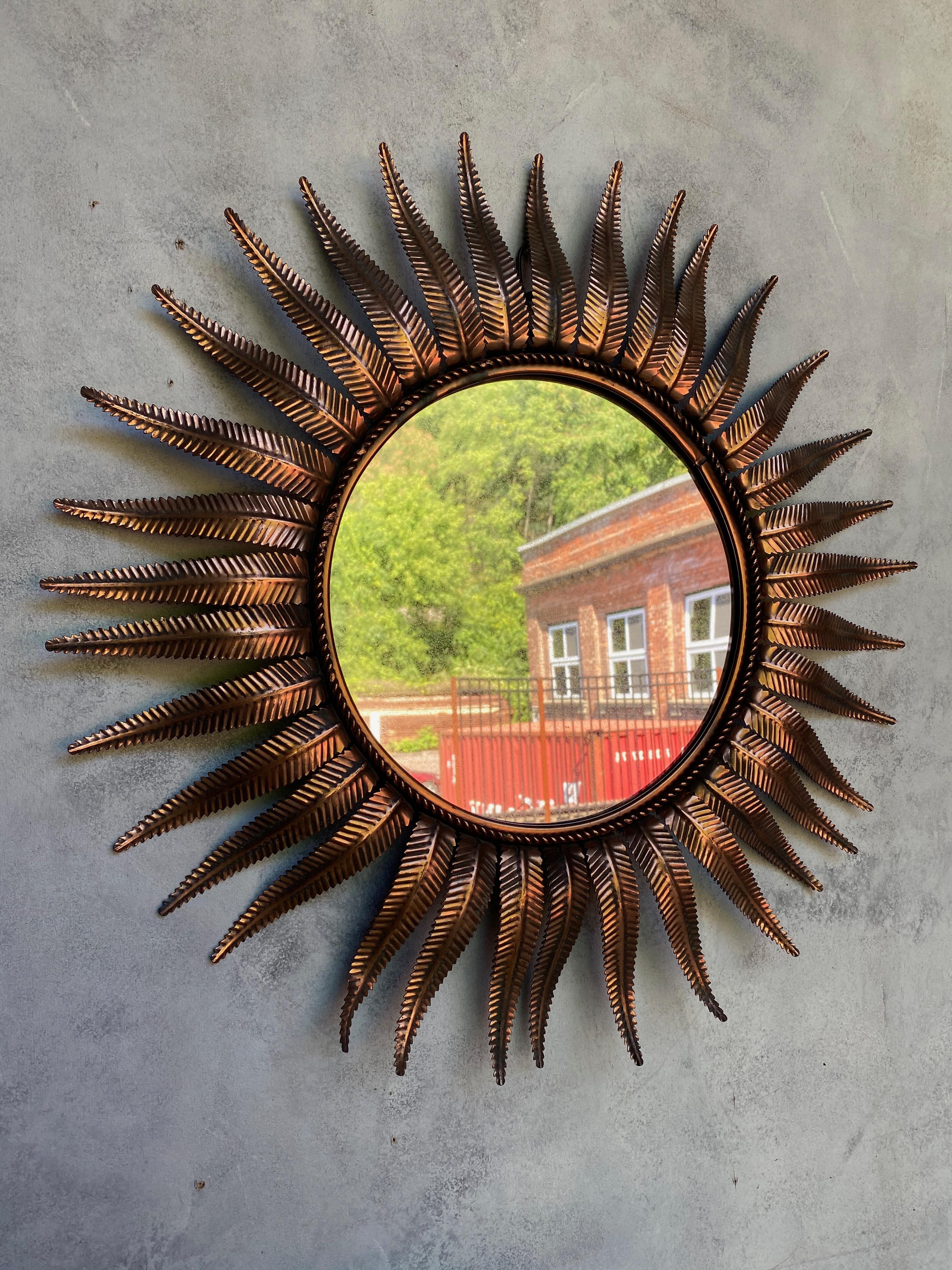 Mid-20th Century Round Spanish Copper Plated Metal Sunburst Mirror with Fern Leaf Frame For Sale