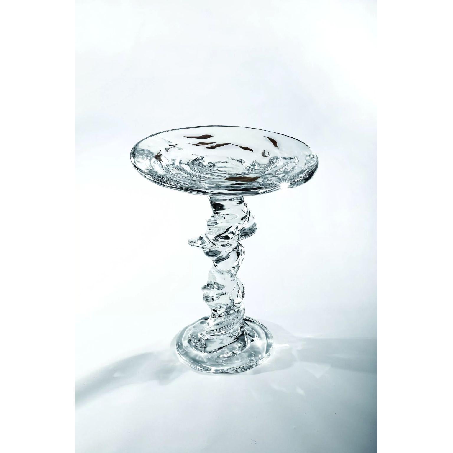Round Spiral Table by Dainte
Dimensions: D 47 x H 55 cm.
Materials: Crystal.

This finely crafted crystal round table is a sophisticated piece of decor that will significantly enhance any space. making a striking statement. Natural wooden branches
