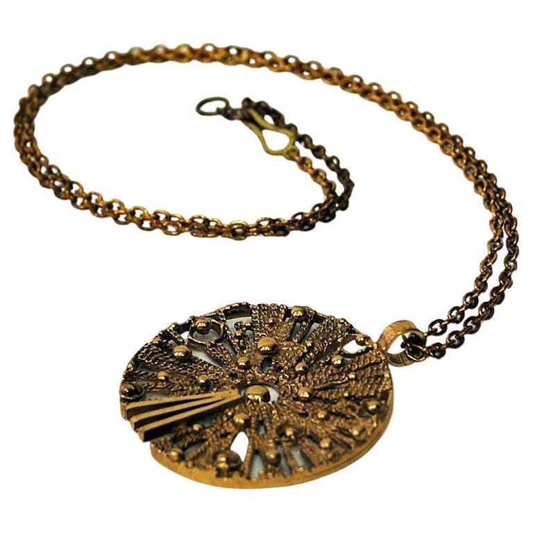 Round sunshaped vintage bronze necklace 19601970s For Sale at 1stDibs