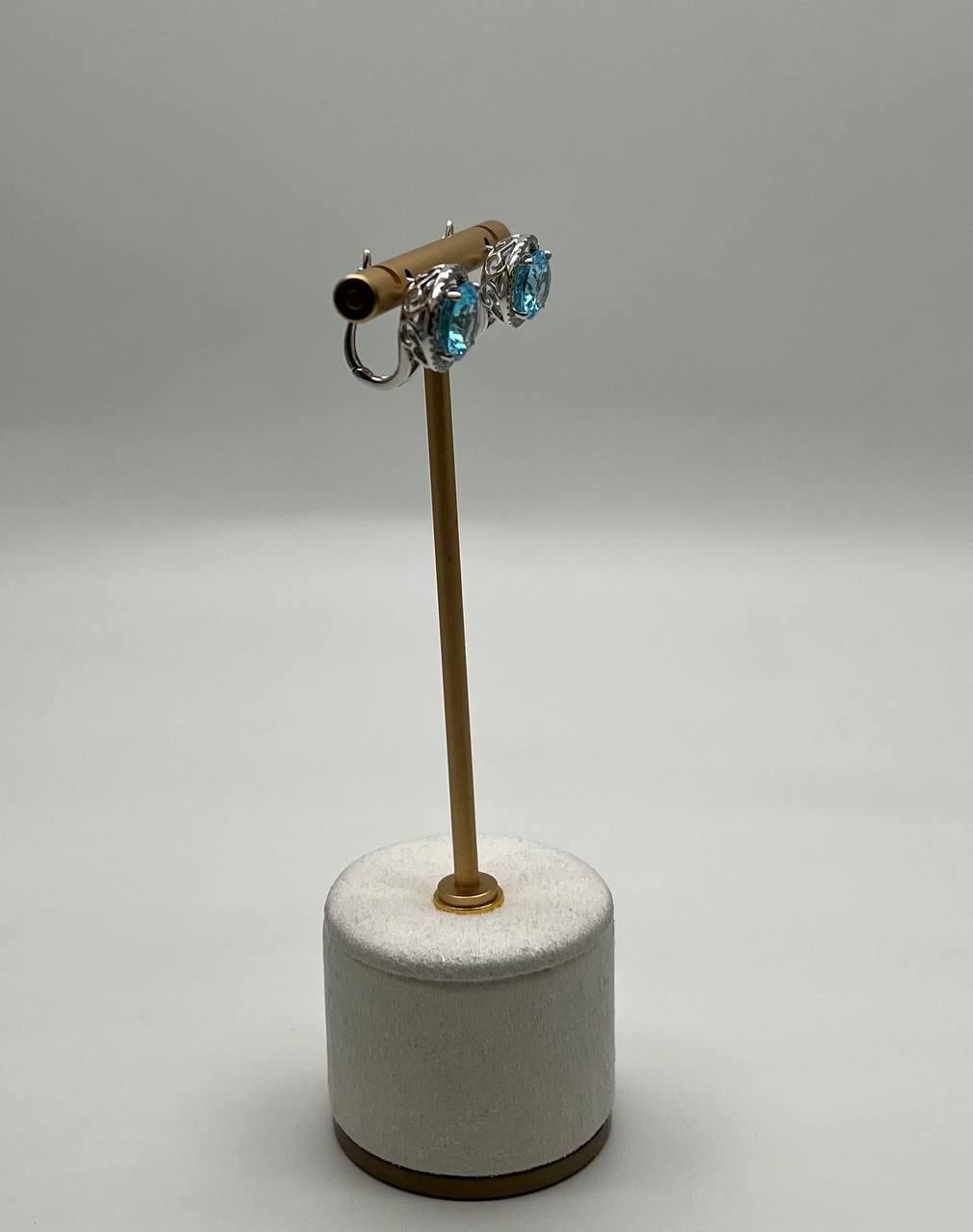 Modern Round Swiss Blue Topaz Diamond Halo 14K White Gold Stud Earrings For Sale