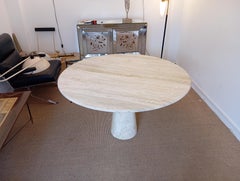 Round table in natural travertine circa 1970