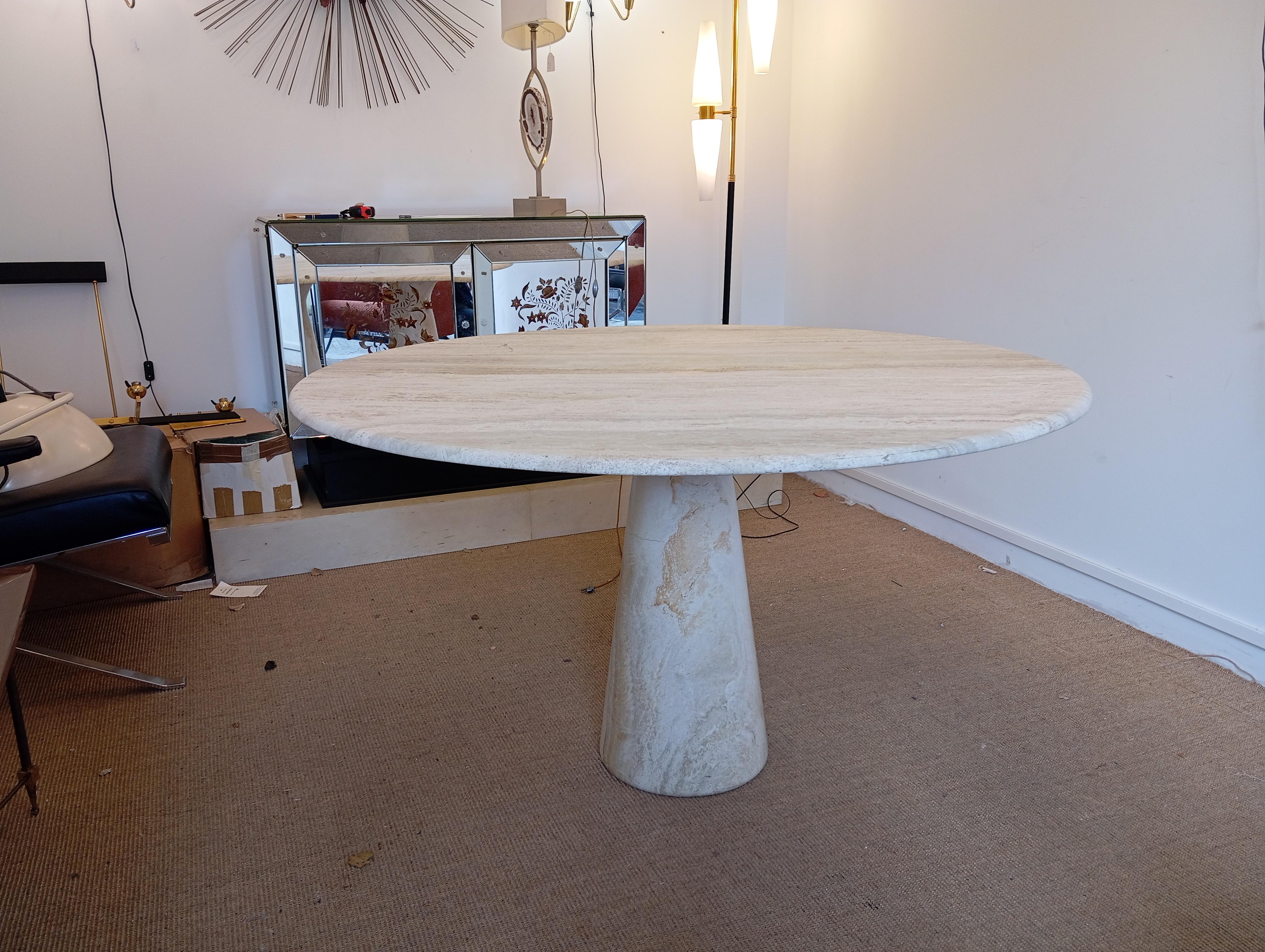 Italian Round table in natural travertine circa 1970
