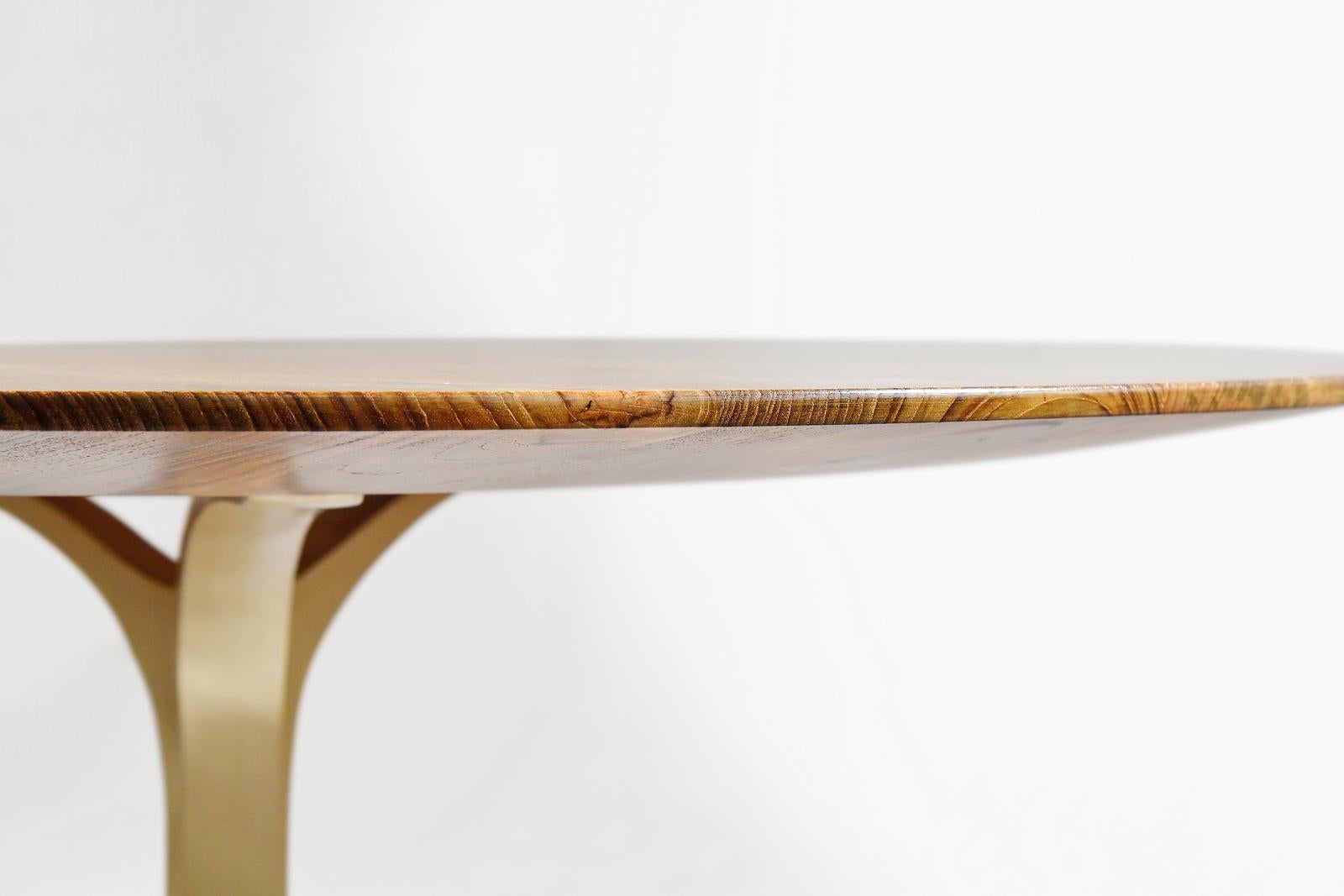 Contemporary Round Table, Reclaimed Light Teak wood and Sand Cast Brass Base by P. Tendercool For Sale