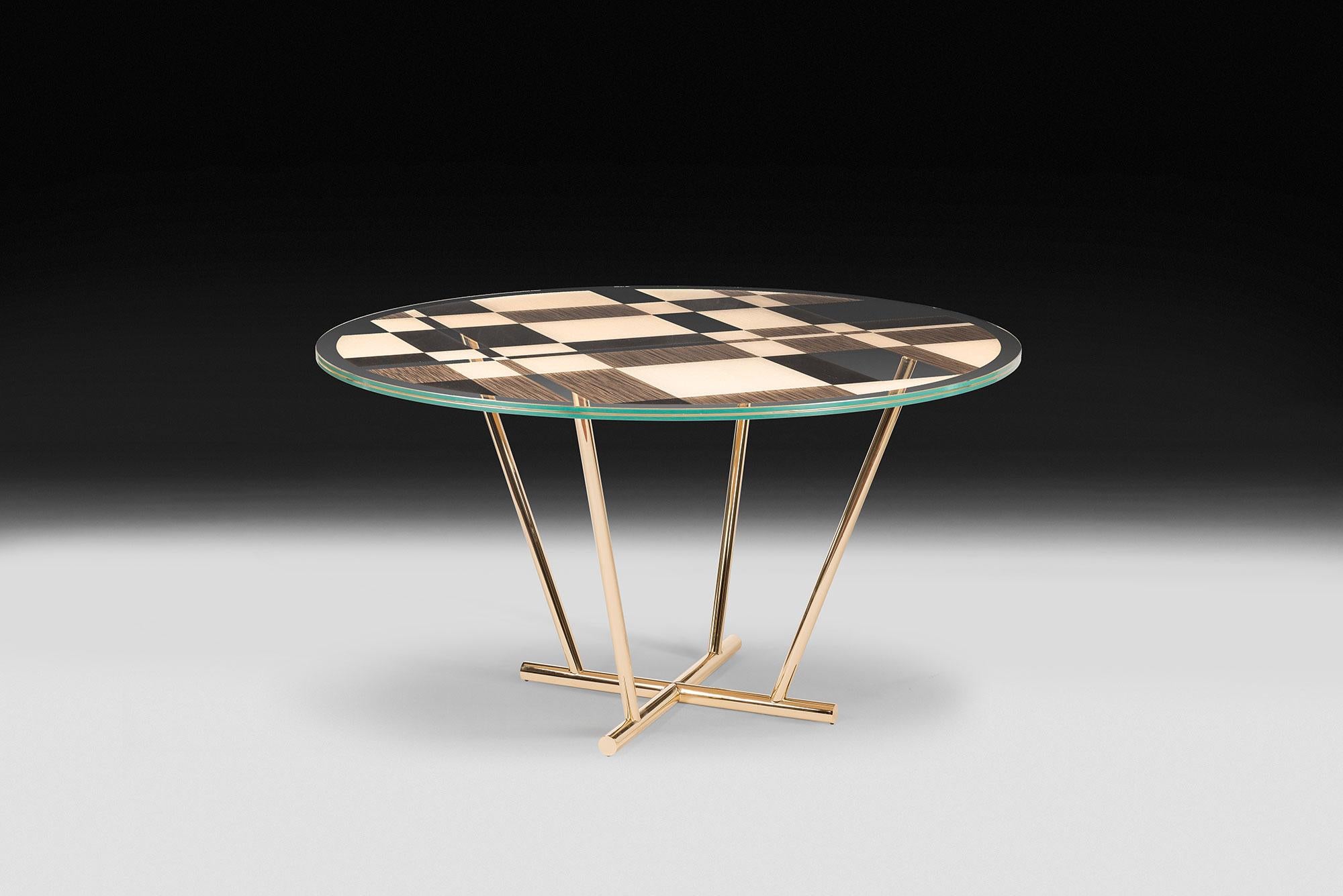 Round-shaped table, featured by a modern elegant design, inspired by the pictures of the famous Dutch painter Piet Mondrian and his usual geometries.

Part of unNatural collection, it comes out from a research on natural phenomena as well as